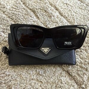 Prada Black Women's Cat-Eye Sunglasses with Gold Logo Accent